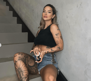 Ashley Resch promoting a Tattoo Balm