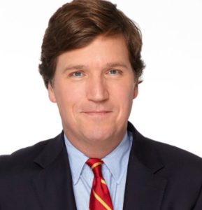 does tucker carlson wear a hair piece