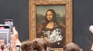 Mona Lisa Attacked With Cake At Da Vinci Painting Video