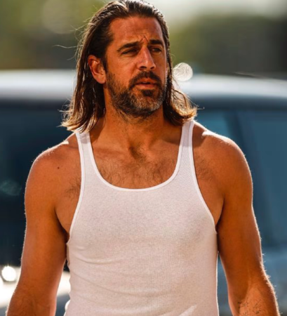 Aaron Rodgers' Con Air inspired look, and Nic Cage in Con Air