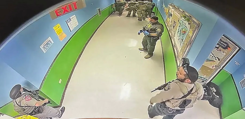 Viral new video showing officials fleeing as Uvalde gunman enters schools sparks backlash online
