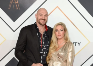 Tyson Fury and his wife  Why Do Fans Believe Tyson Fury Have A Sister? His Siblings Names Revealed Tyson Fury with his wife 300x213