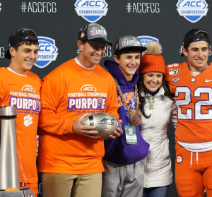 Dabo Swinney with his wife and children in a pre-game program