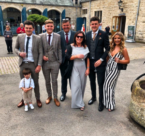 Harry Maguire with his parents and siblings