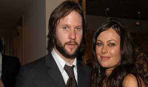 Polly Walker with her husband