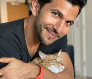 Christmas With You star Gabriel clicks with his cat.