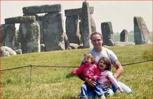 Gary with his daughters Anya and Katya on their trip to Stonehenge, England.