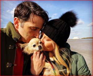 Laura Woods and her husband Mark Arigho bidding farewell to their chihuahua Minnie.